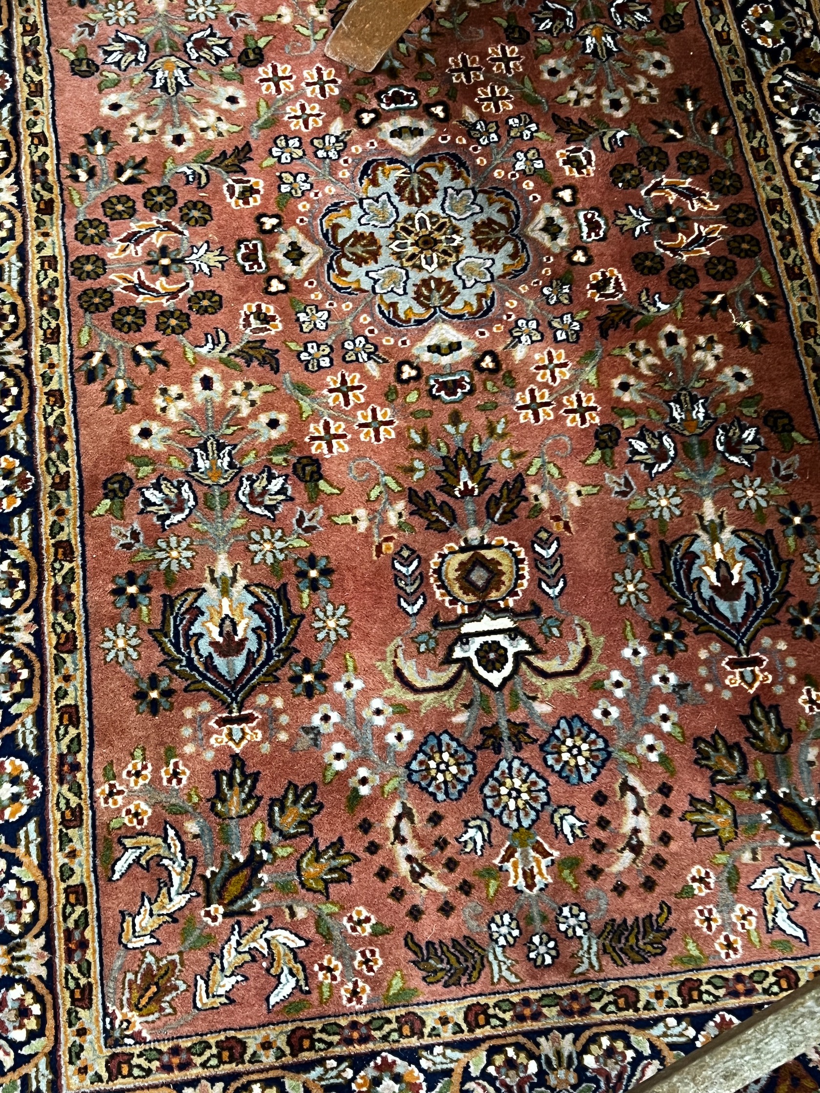 A North West Persian peach ground rug, 160 x 93cm